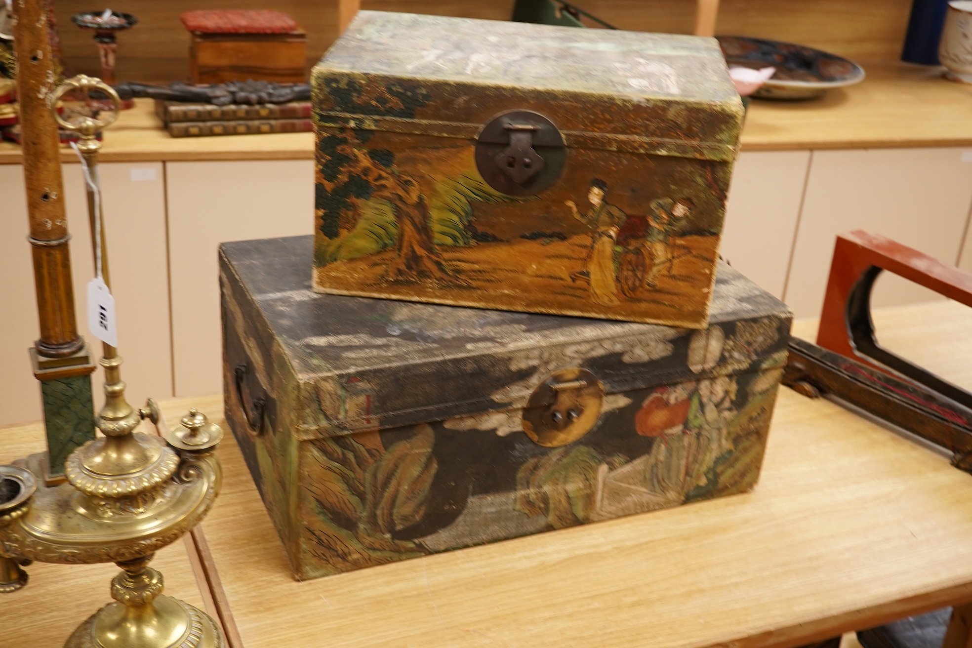 Two Chinese polychrome decorated hide chests, largest 56cm wide